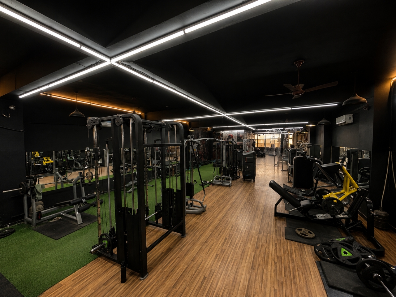 Main training floor with neon lighting