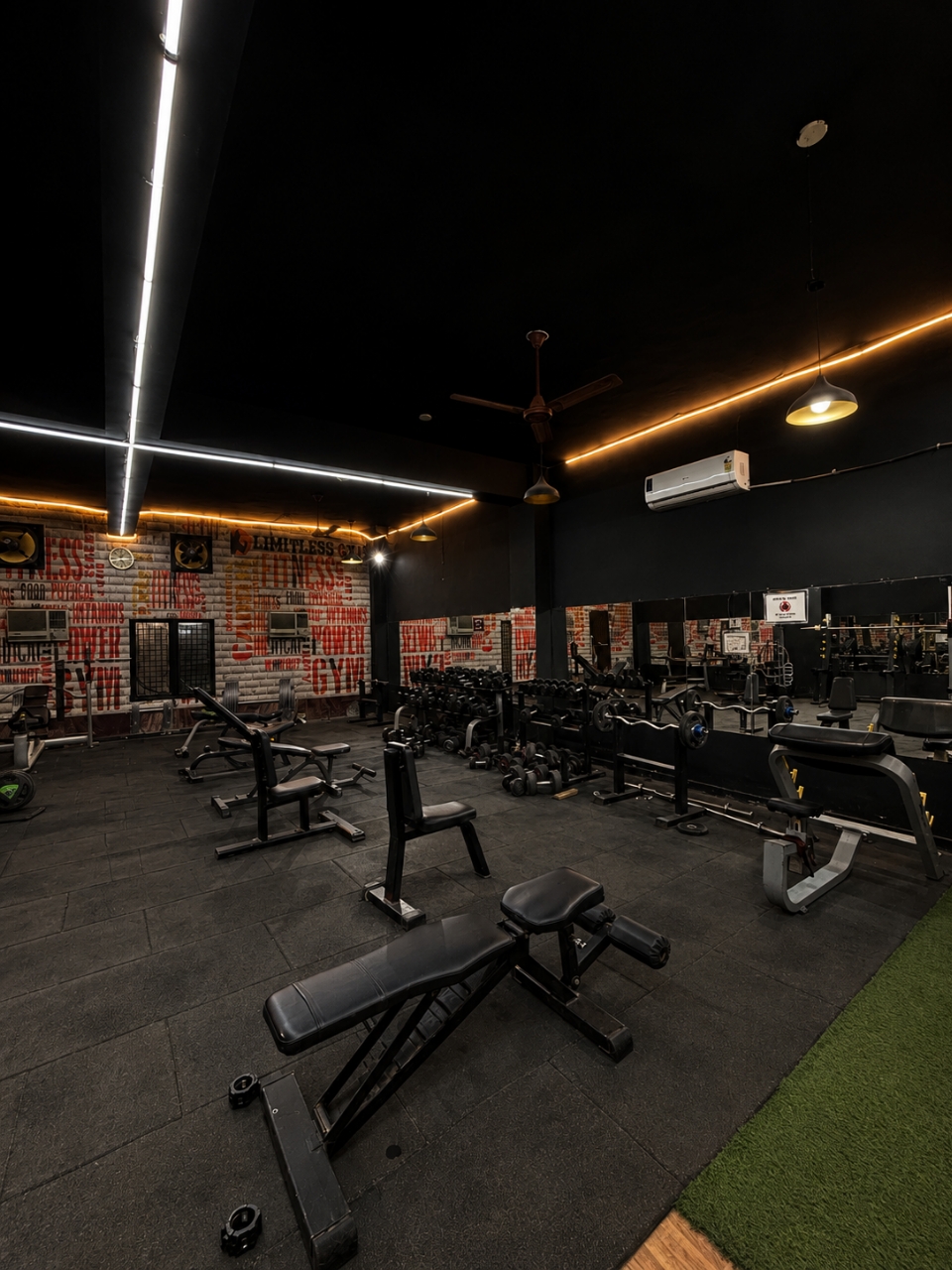 Dumbbell area with branded wall